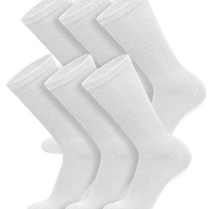 May include: Six pairs of white crew socks. The socks are made of a soft, comfortable material and are perfect for everyday wear.