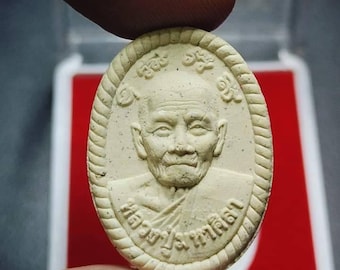 Luang Pu Maha Sila Amulet Coin: Thai Buddhist Charm for Luck & Love