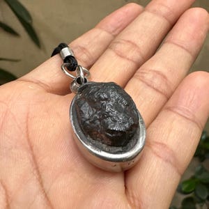 Sacred Lek Lai Thai Amulet: Silver Cased Wealth Talisman