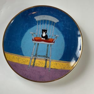 Upon high by Toni goffe. Danbury mint collectors plate with 22carat gold