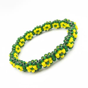 Orula Ilde | Blumenmuster – Handgefertigtes Armband aus grünen und gelben Kristallperlen zum spirituellen Schutz