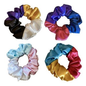 May include: Four colorful satin scrunchies with different color combinations. Each scrunchie is made of three colors of satin fabric.