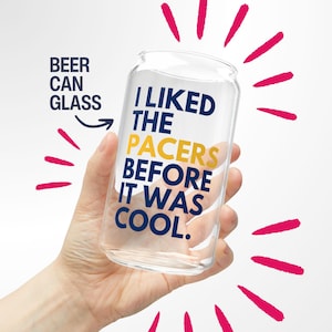 May include: A clear glass beer can with the text "I LIKED THE PACERS BEFORE IT WAS COOL." printed on it in blue and yellow.