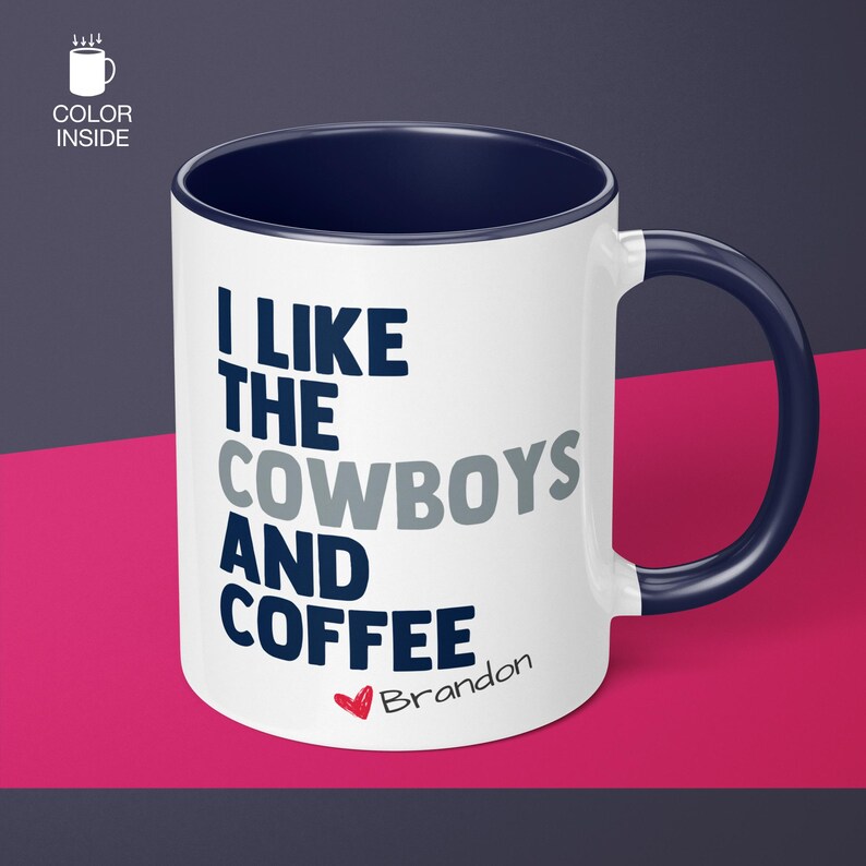 May include: White ceramic coffee mug with a navy blue rim and handle. The mug has the text "I like the cowboys and coffee" in navy blue and grey lettering. The name "Brandon" is written in navy blue lettering with a red heart.