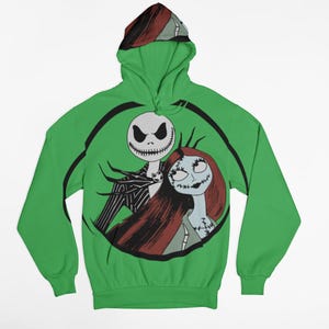May include: A green hooded sweatshirt with a black and white illustration of Jack Skellington and Sally from The Nightmare Before Christmas.