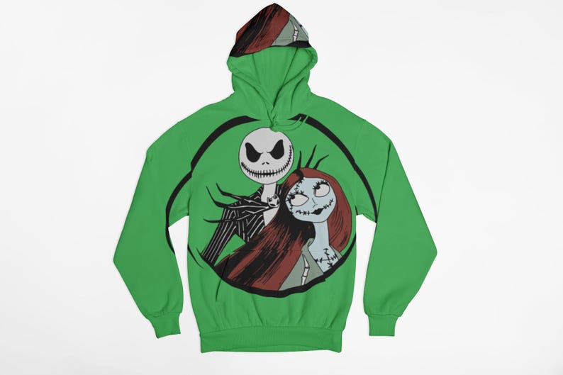 May include: A green hooded sweatshirt with a black and white illustration of Jack Skellington and Sally from The Nightmare Before Christmas.