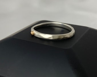 Silver dot ring.Matte finish hammered ring. Ring with 14k gold dot.