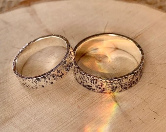 Textured sterling silver or gold wedding ring.