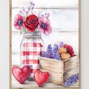 Peut inclure: Une peinture à l'aquarelle d'un bocal en verre à carreaux rouges et blancs rempli de roses rouges et d'anémones roses. Le bocal est posé sur une surface en bois avec une boîte en bois remplie de fleurs violettes et deux décorations en forme de cœur. La peinture est encadrée dans un cadre en bois clair.