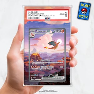 May include: A Charizard EX Pokémon card in a protective case, graded GEM MT 10 by PSA. The card features a vibrant illustration of Charizard with a fiery background. The card is labeled "Slab City Favorite Card" and "Pokemon Extended Arts".
