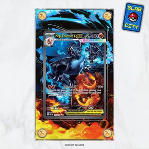 May include: A framed Mega Charizard X EX trading card with a blue and orange background. The card features a detailed illustration of a dragon-like creature. The frame is clear with gold-colored screws. A small "SLAB CITY" sticker is in the upper right corner.
