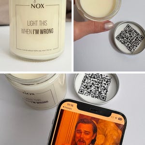 May include: A glass jar candle with a silver lid, labelled "LIGHT THIS WHEN I'M WRONG." The image includes a QR code on a lid and a phone screen showing a meme with the text "I'm always right, Mike.". The candle is made of soy wax.