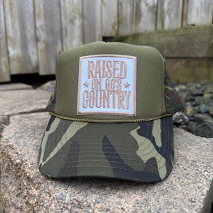 Raised on 90s Country Patch Camo Trucker Hat