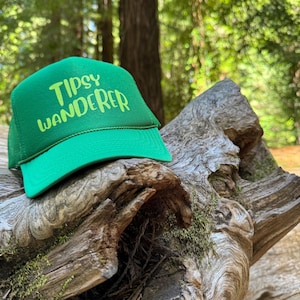 Tipsy Wanderer Trucker Hats