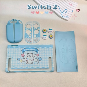May include: A light blue Switch 2 case set with a Cinnamoroll design. The set includes a protective case, controller covers, and decorative buttons. The case has a gingham pattern and the text "Cinnamoroll".