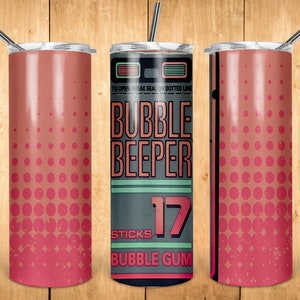 May include: A stainless steel tumbler with a pink and red dot pattern and the words "Bubble Beeper" on a gray background. The tumbler includes a silver straw and a lid. The design is reminiscent of retro packaging.
