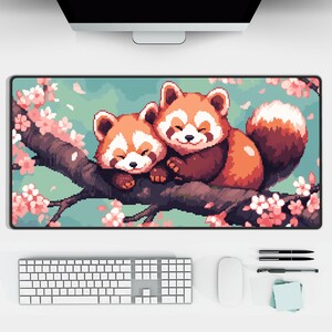 May include: A digital illustration of two red pandas cuddling on a branch with pink cherry blossoms. The red pandas are pixelated and have a cartoon style.