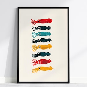 May include: A framed vertical print on a light cream background featuring a column of eight stylized squid illustrations. The squid are arranged in a single row, colored in red, dark blue, teal, yellow, and orange with textured ink details.
