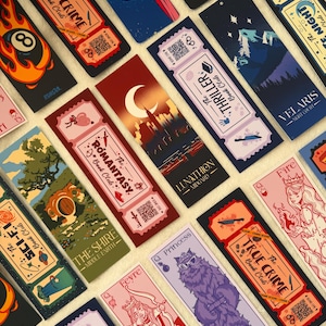 May include: A collection of rectangular bookmarks featuring various graphic designs, including ticket-style layouts for The True Crime Book Club, The Thriller Book Club, and The Romantasy Book Club, alongside illustrations of landscapes, characters, and icons.