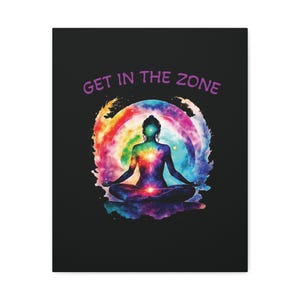 May include: A canvas print featuring a meditating figure in a lotus position, surrounded by a vibrant rainbow-colored aura. The words "GET IN THE ZONE" are written in purple above the figure against a black background.