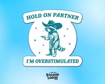Hold On Partner I'm Overstimulated Vinyl Sticker - Funny Cowboy Raccoon