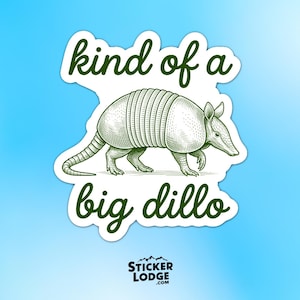 May include: A sticker with a green and white design. The sticker features an illustration of an armadillo with the words "kind of a big dillo" in a playful font. The sticker has a blue background.