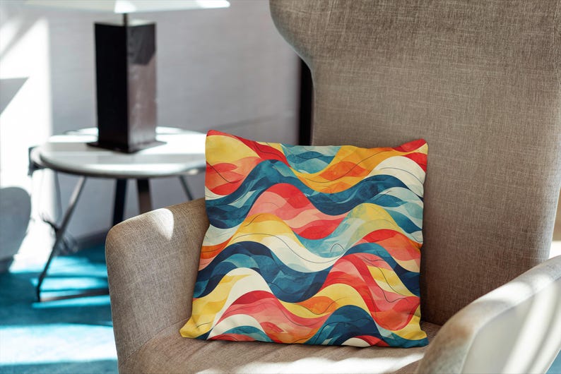 May include: A square throw pillow featuring a repeating pattern of horizontal wavy lines in shades of red, orange, yellow, and blue. The design consists of overlapping, fluid curves that create a sense of movement across the entire surface of the pillow.