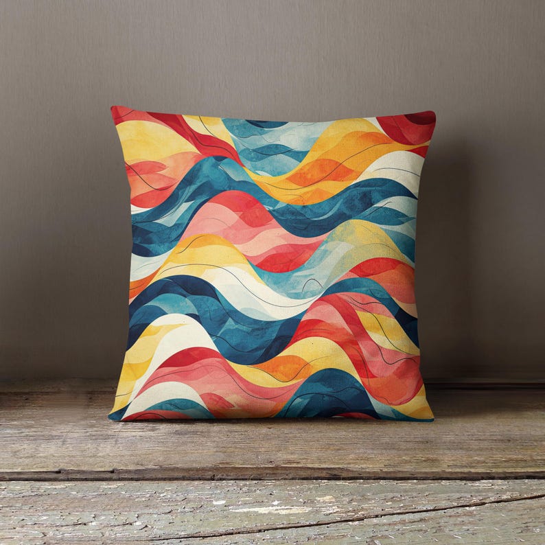 May include: A square throw pillow featuring a repeating pattern of flowing, wavy lines in vibrant shades of red, deep blue, golden yellow, and soft cream. The design creates a fluid, layered effect across the entire surface of the pillow.