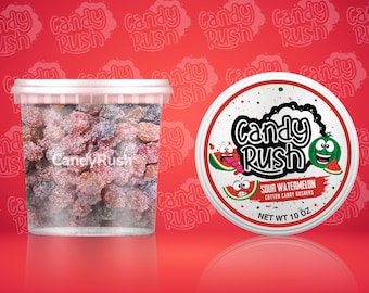 May include: A clear plastic container filled with sour watermelon flavored cotton candy gummies. The container is labeled "Candy Rush". The label also features a cartoon watermelon with a smiling face.