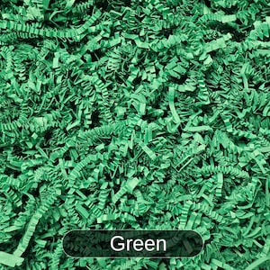 May include: Green shredded paper, a popular choice for gift wrapping and packaging.