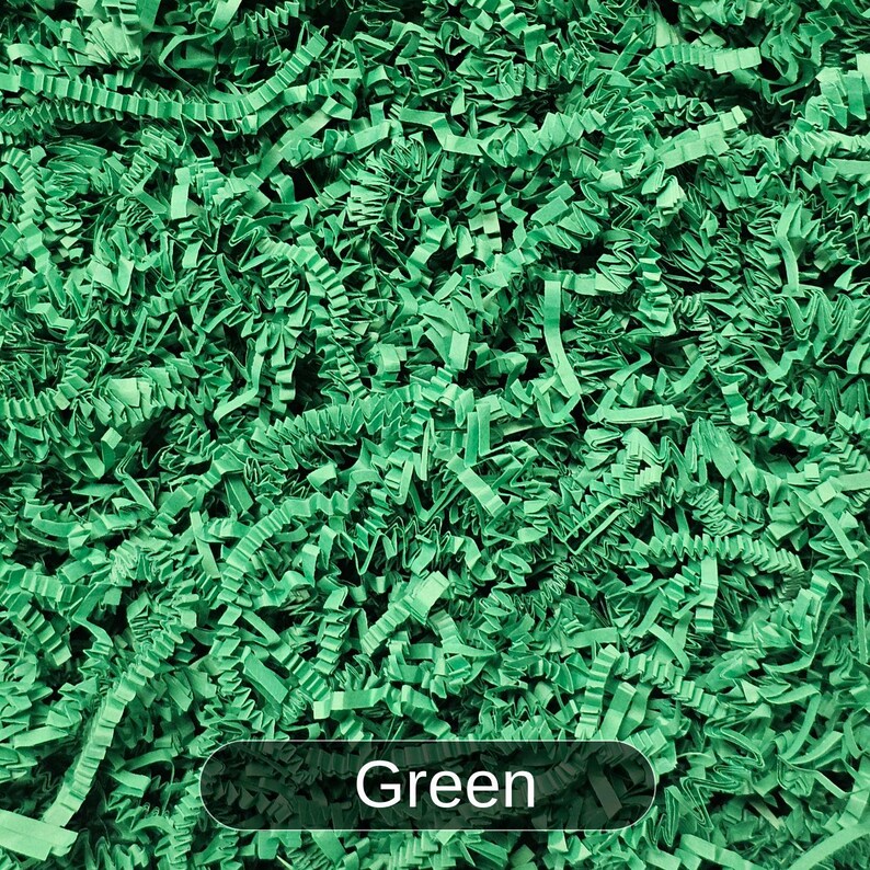 May include: Green shredded paper, a popular choice for gift wrapping and packaging.