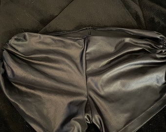Poly/spandex leather look booty shorts