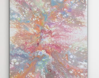 May include: Abstract acrylic painting on canvas. The artwork features a burst of colors, including pink, orange, blue, and white, creating a dynamic and energetic composition. The paint is applied in a fluid, flowing style, with visible textures and patterns.