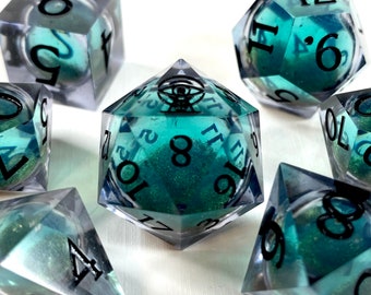 Sentinel - colour change liquid core teal and gold sharp edge DnD dice set