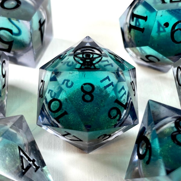 Sentinel - colour change liquid core teal and gold sharp edge DnD dice set