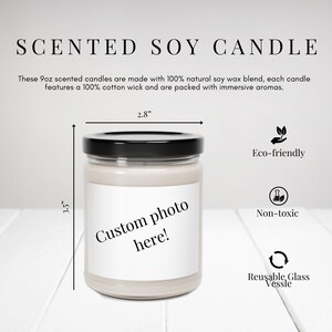 May include: A scented soy candle in a clear glass jar with a black lid. The label reads "Custom photo here!". The candle is 2.8 inches wide and 3.5 inches tall. The text also mentions it is eco-friendly, non-toxic, and has a reusable glass vessel.