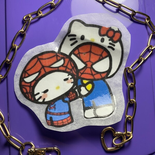 2 hello kitty spiderman stickers