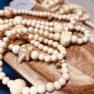 Wooden Bead Garland with Hand Gilded Dreidels Ribbon and Bells