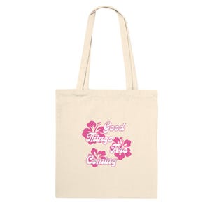エコフレンドリーなトートバッグ - ハイビスカスの花が「良いことがやってくる」をデザイン - 毎日の持ち運びに最適