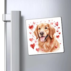 May include: Square magnet featuring a watercolor illustration of a Golden Retriever with a happy expression, surrounded by red hearts. The dog has golden fur and a pink nose, perfect for dog lovers.