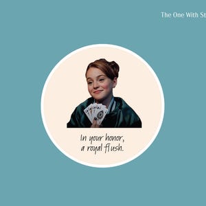 Circle sticker of Hallie Parker playing poker and holding up cards with caption that reads in your honor, a royal flush from The Parent Trap movie
