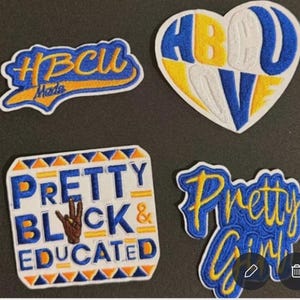 May include: Four embroidered patches with text and designs. One patch reads "HBCU Made" in blue and gold. Another is a heart shape with "HBCU LOVE" in blue, yellow, and white. A third says "PRETTY BLACK & EDUCATED" with a hand gesture. The last says "Pretty Girl".