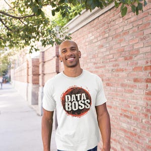May include: A white t-shirt with a red circle and the text "DATA BOSS" in black and white lettering.
