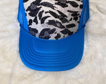 Blue trucker hat with Animal Print patch