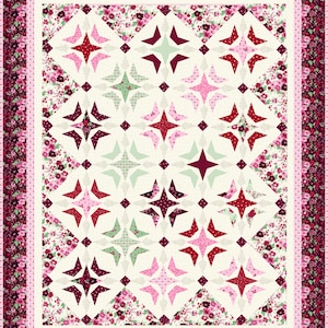 May include: A patchwork quilt with a star design. The quilt has a cream-coloured base with star shapes in red, pink, and green. The border is a dark burgundy floral print, and the quilt is framed with a pink border.