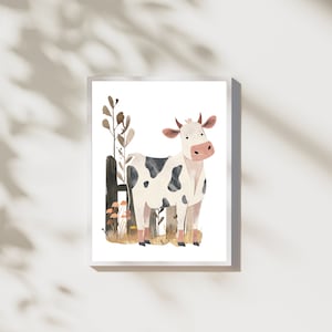 May include: Watercolor illustration of a cow with black spots, standing in a field. The cow has a pink nose and ears, and small horns. The artwork is framed in a white border, with a fence and plants in the background. The style is whimsical and charming.