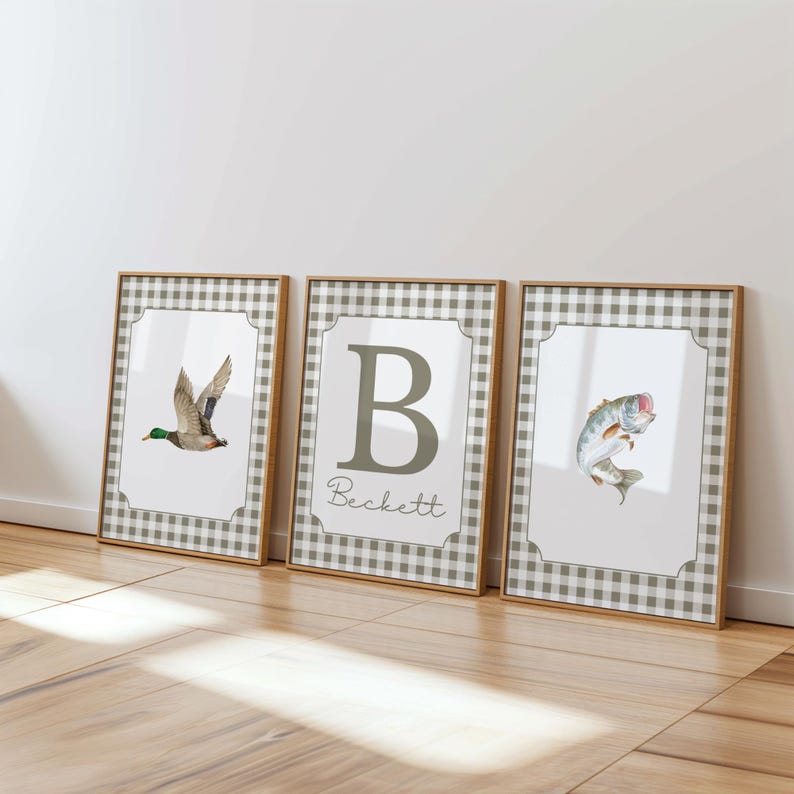 May include: Three framed prints with a gingham pattern border. The prints feature a flying duck, the letter B with the name Beckett, and a fish jumping out of the water.