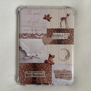 May include: Transparent tablet case with a collage design. The design includes text that reads "The smells of apple and cinnamon", "dream a little dream of me", and "MY DARLING Little Sweetheart." The collage also features a deer, a leaf, and lace.