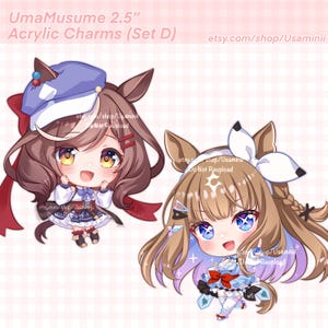 May include: Two acrylic charms featuring anime-style characters with large eyes and detailed outfits. The charms are approximately 2.5 inches in size. The text "UmaMusume 2.5" and "Acrylic Charms (Set D)" are visible.