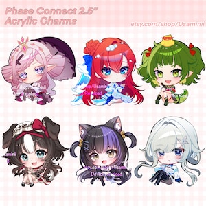 May include: Six chibi-style acrylic charms featuring anime characters with distinct hair colors and outfits. The text Phase Connect 2.5" Acrylic Charms is visible at the top. Each character has large eyes and unique accessories, including a small yellow bird, cat ears, and floral accents, presented in a grid layout.